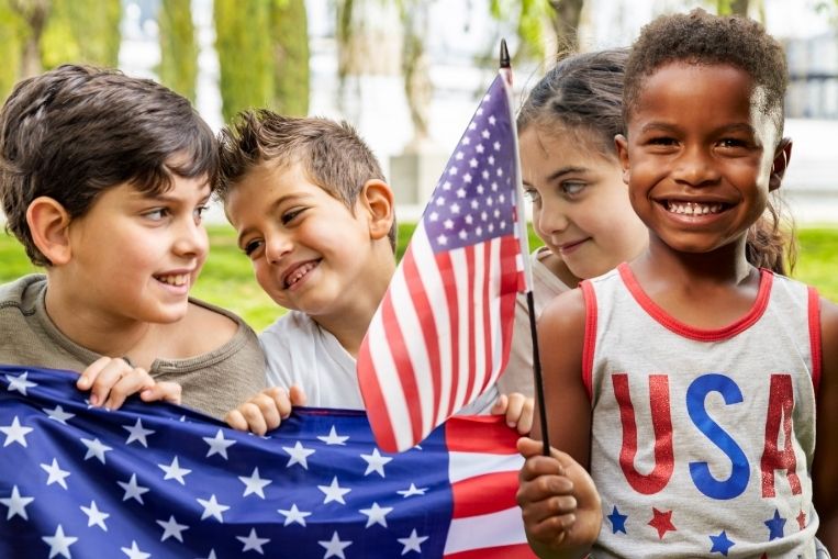 Kids having fun at a 4th July backyard celebration