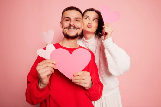 Boyfriend and girlfriend with Valentine's Hearts